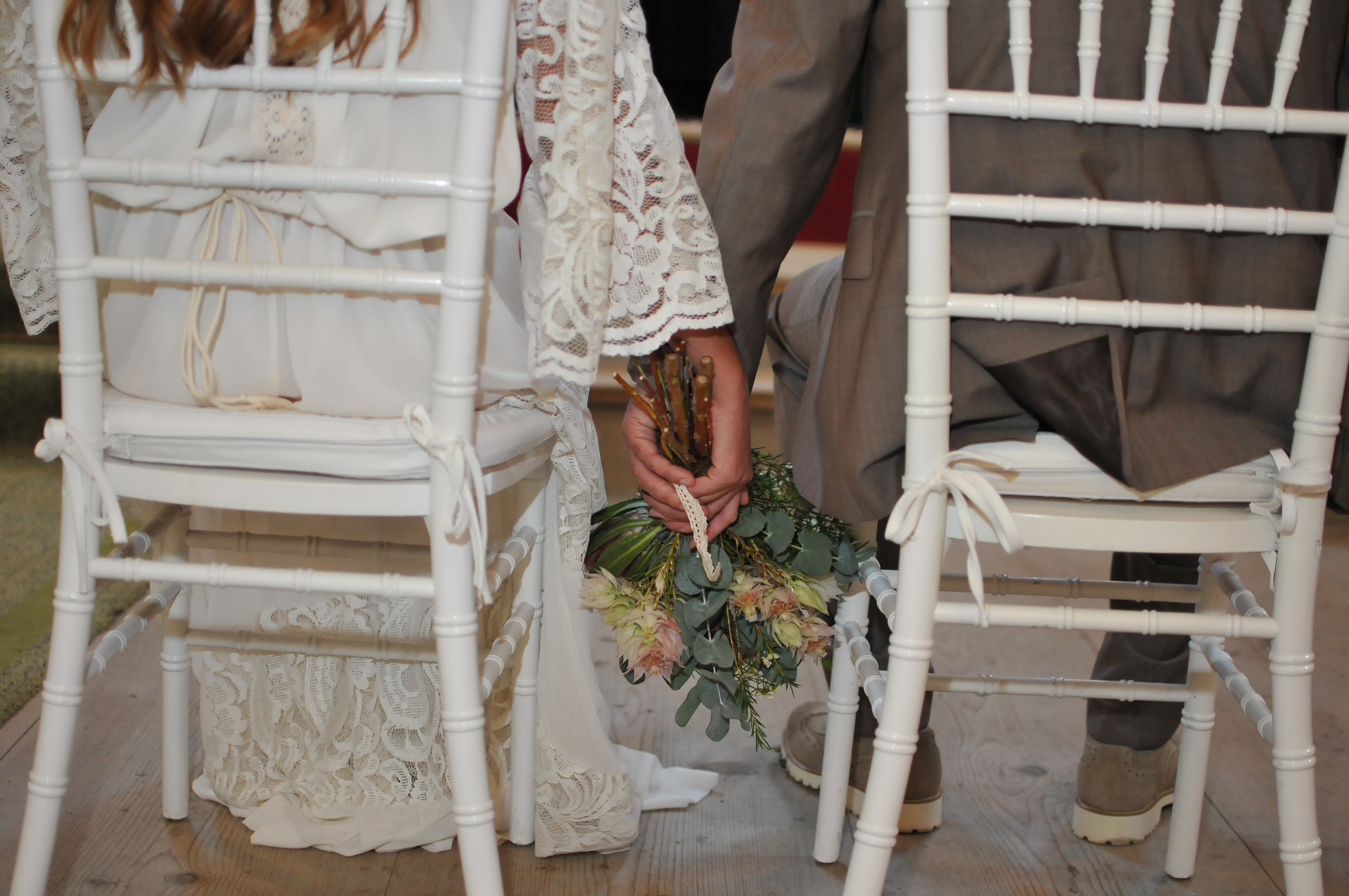 Holding hands in front of the altar